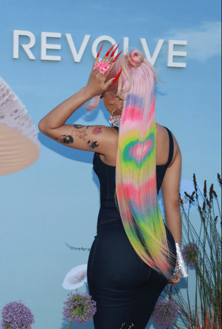 Saweetie Dazzles with Knee Length Rainbow Hair Color at Coachella