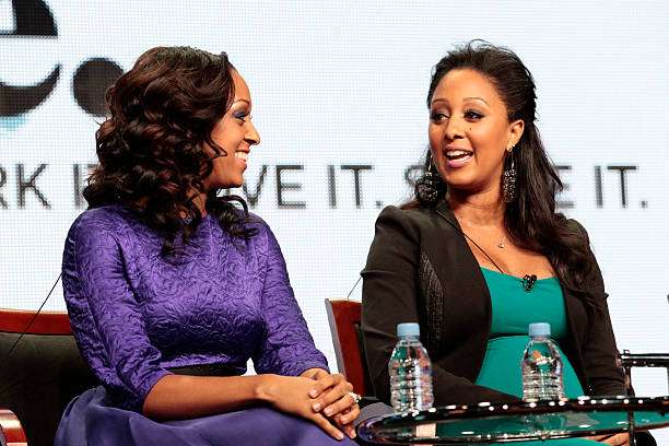 Tia and Tamera Mowry's Silk Presses on Throwback Photos